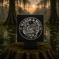 Marsh & Mud Ink Black Logo Koozie